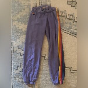 Purple 5-stripe aviator nation sweatpants in a medium